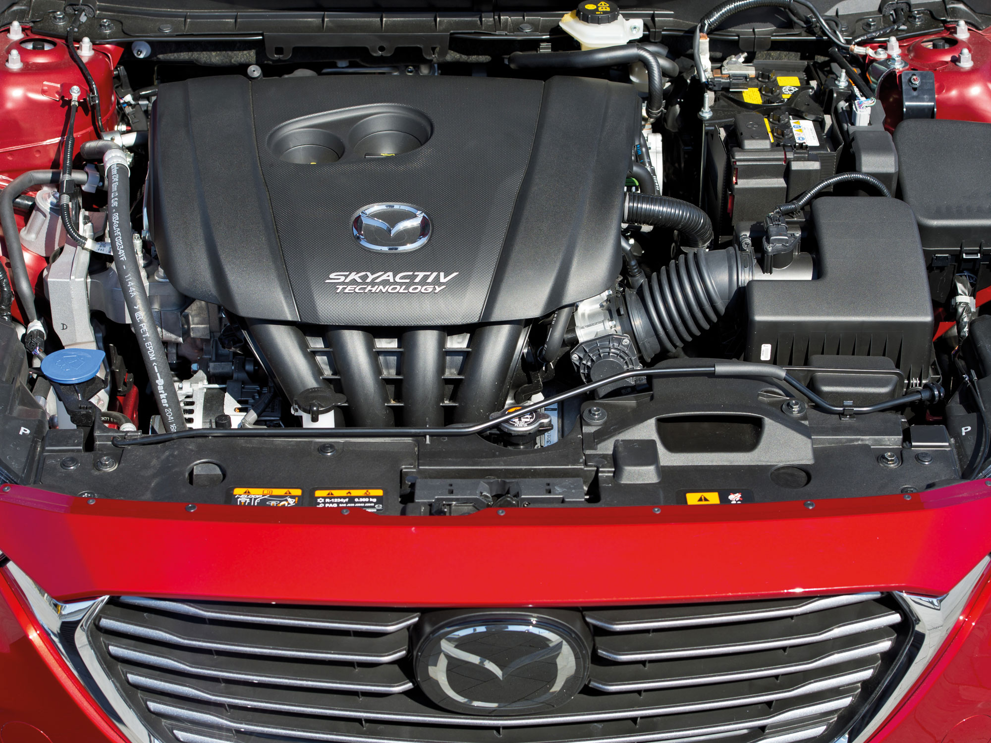 Мазда сх5 моторы. Mazda CX 5 двигатель. Мазда СХ-5 под капотом. Mazda CX 5 под капотом. Мазда CX 5 2.0 двигатель.